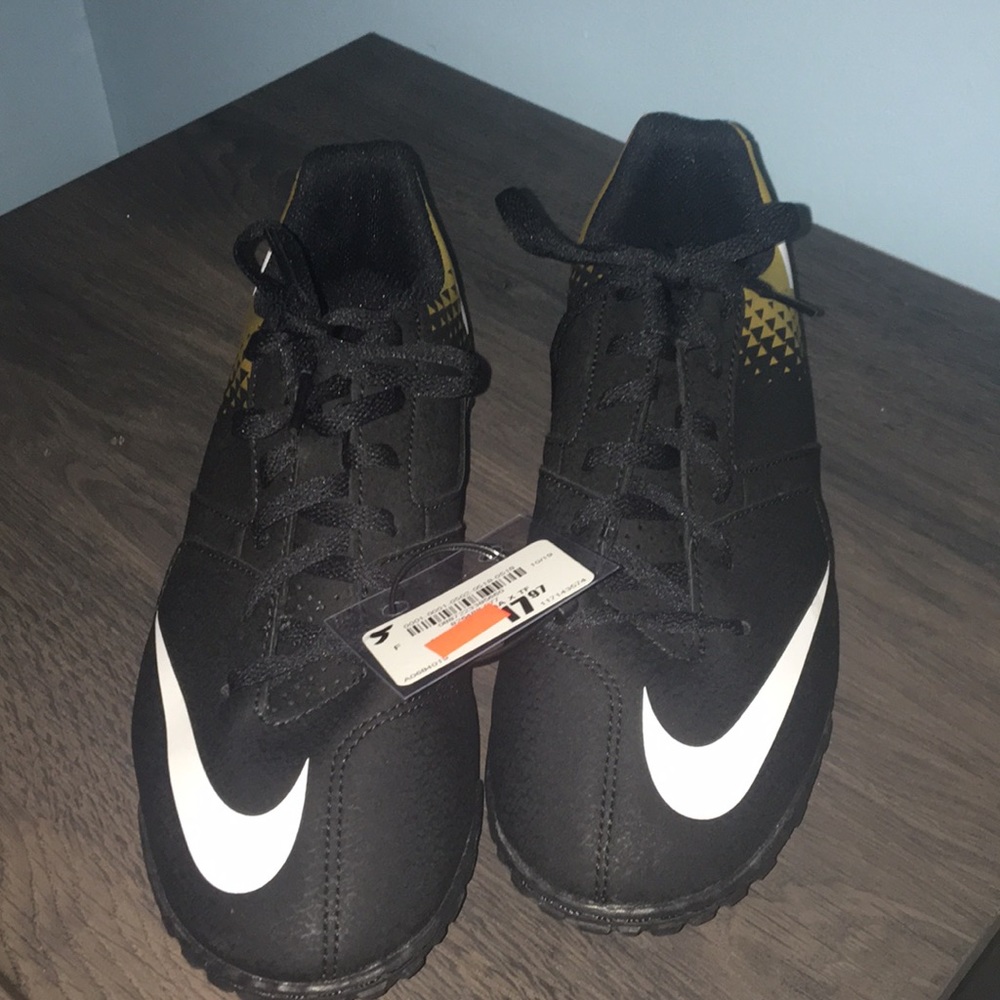 Nike black and gold athletic shoes NWT